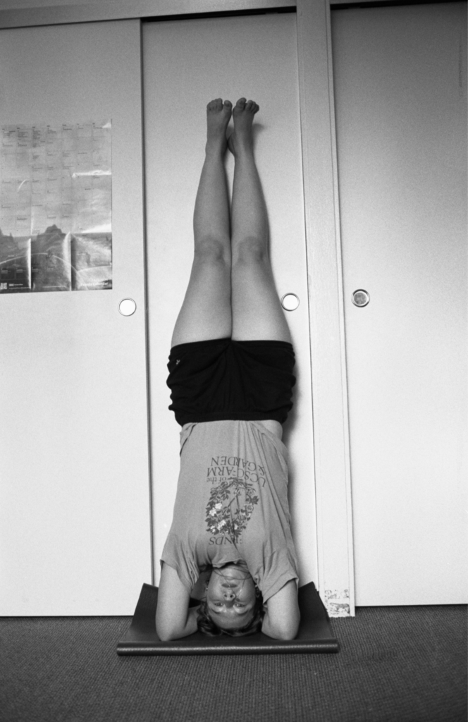 Adeline yoga student in headstand